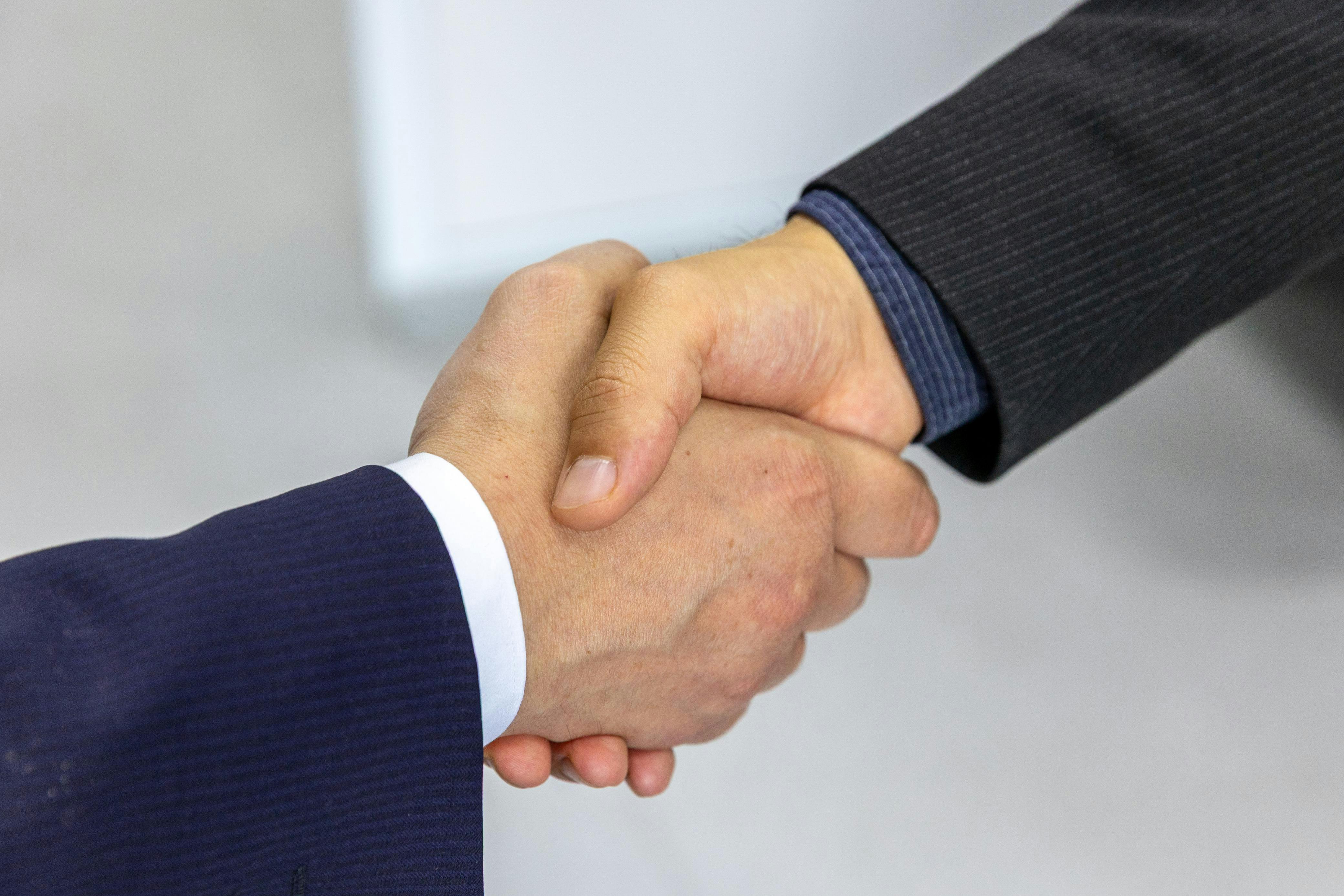 Partnership handshake